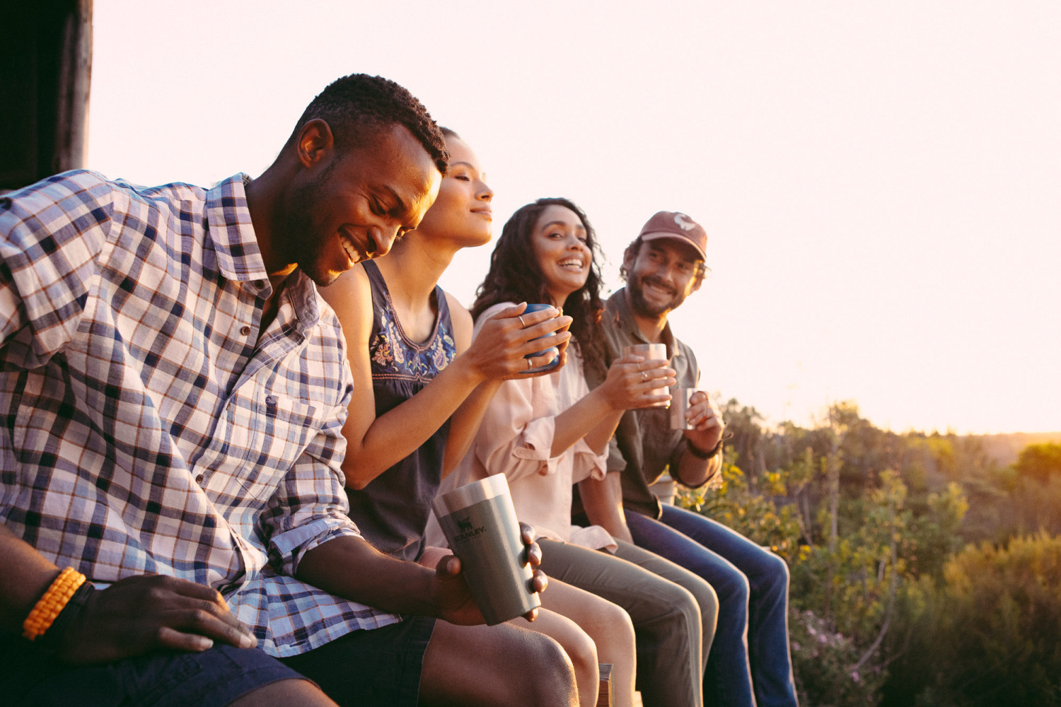 Group of friends enjoying nature outdoors together