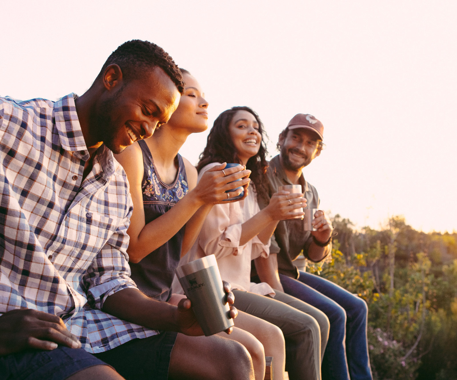 Group of friends enjoying nature outdoors together