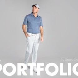 Man in blue shirt posing for photo