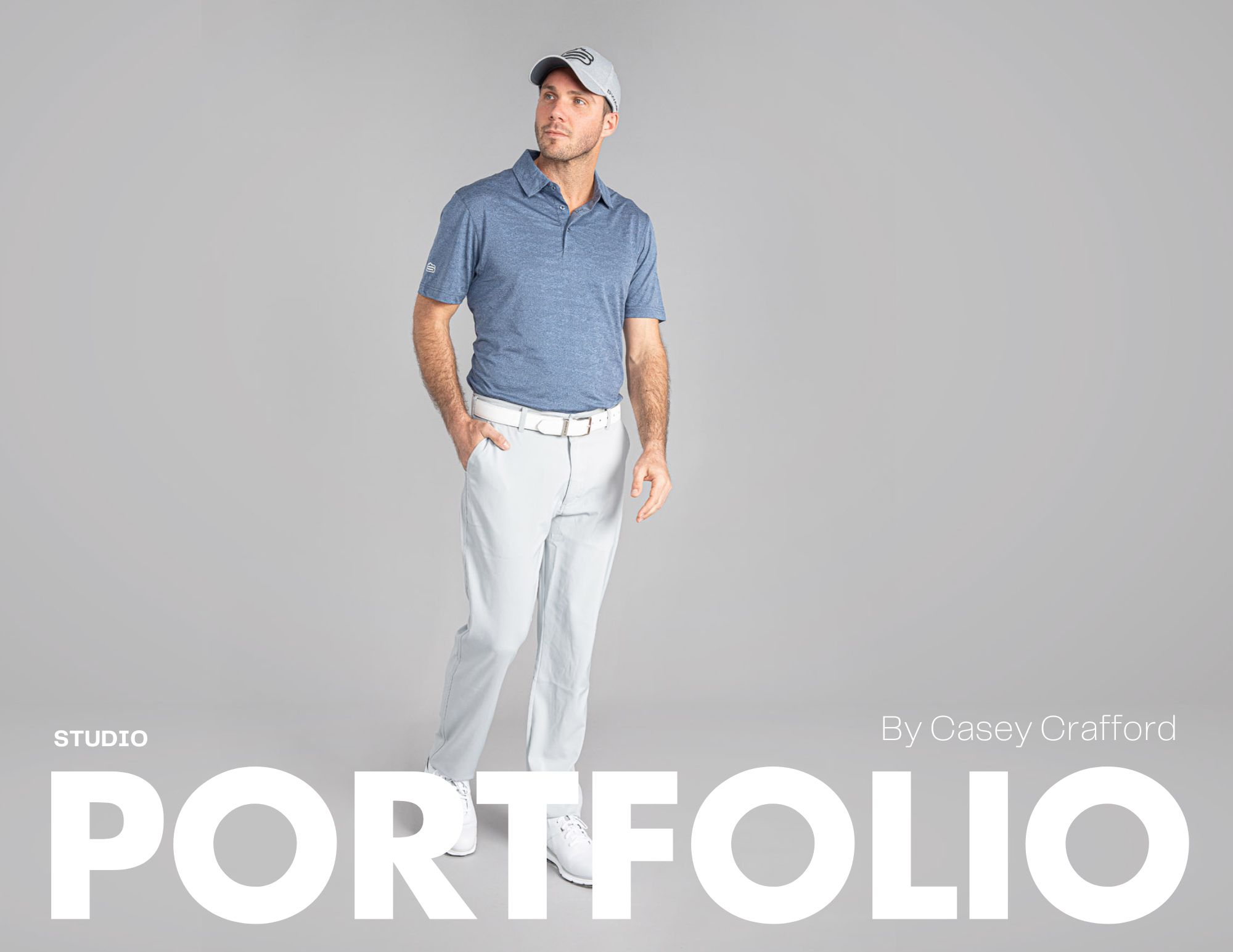 Man in blue shirt posing for photo