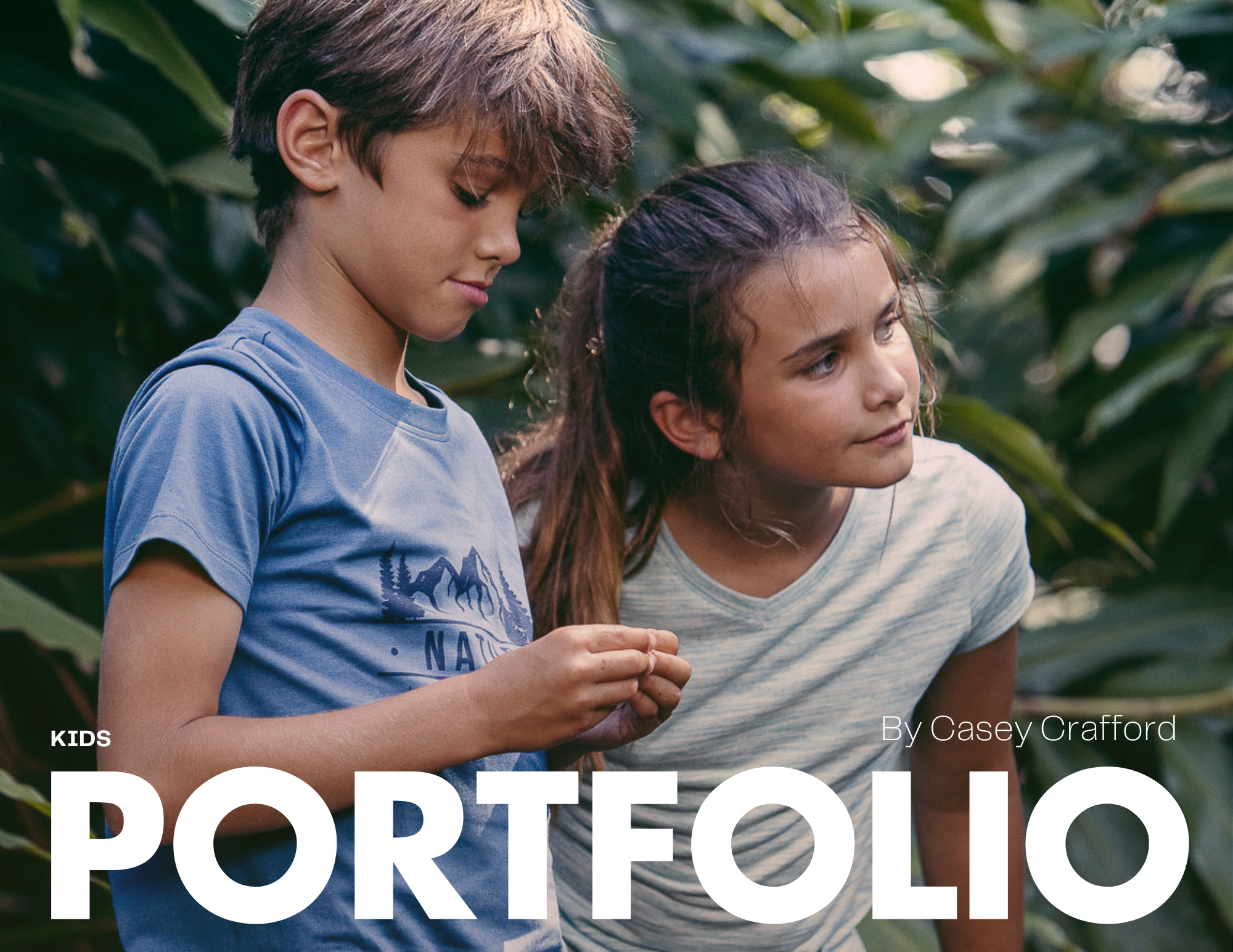 Two children exploring nature in outdoor garden.