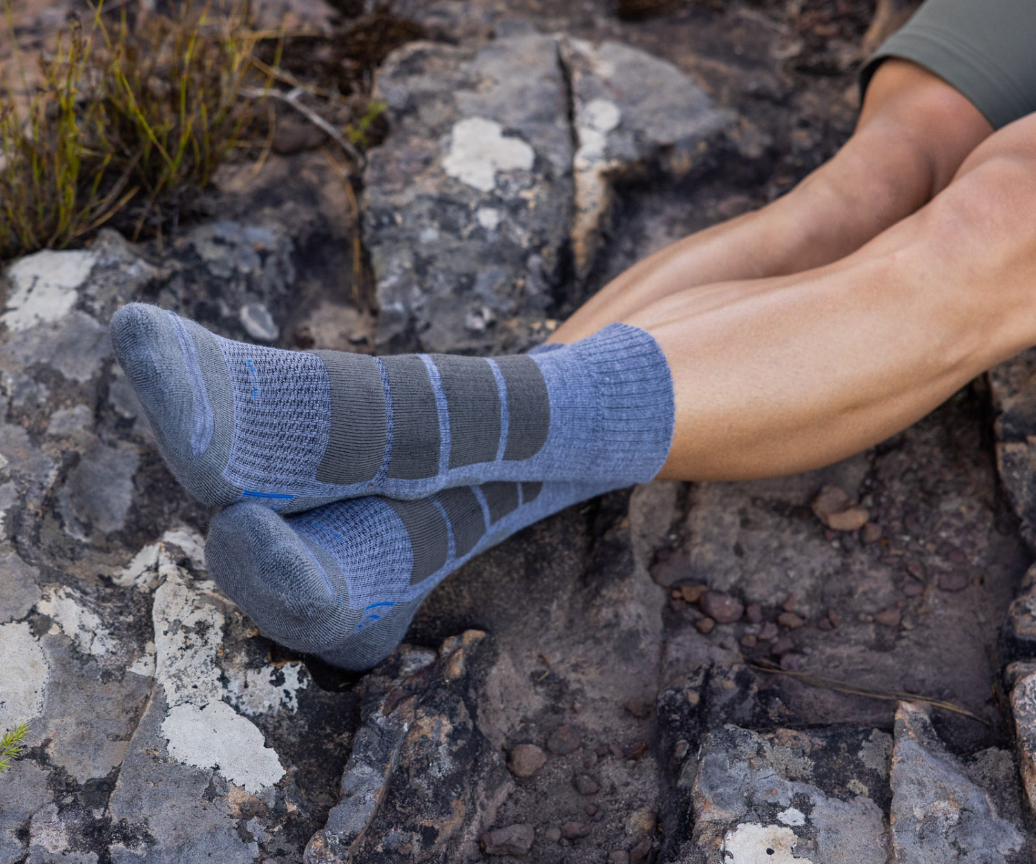 Hiking socks on rocky terrain outdoors adventure