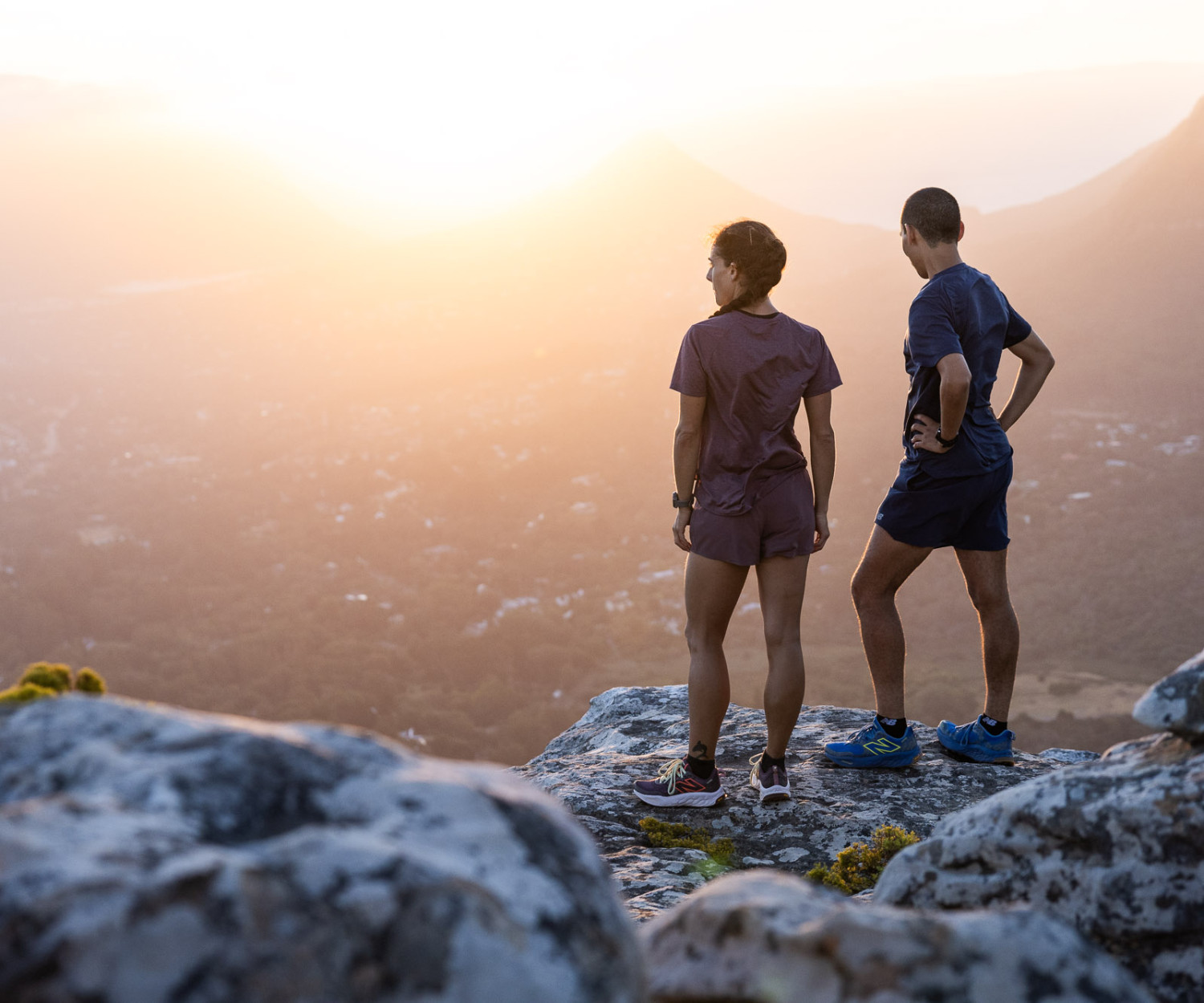 Hikers enjoying mountain view at sunrise moment