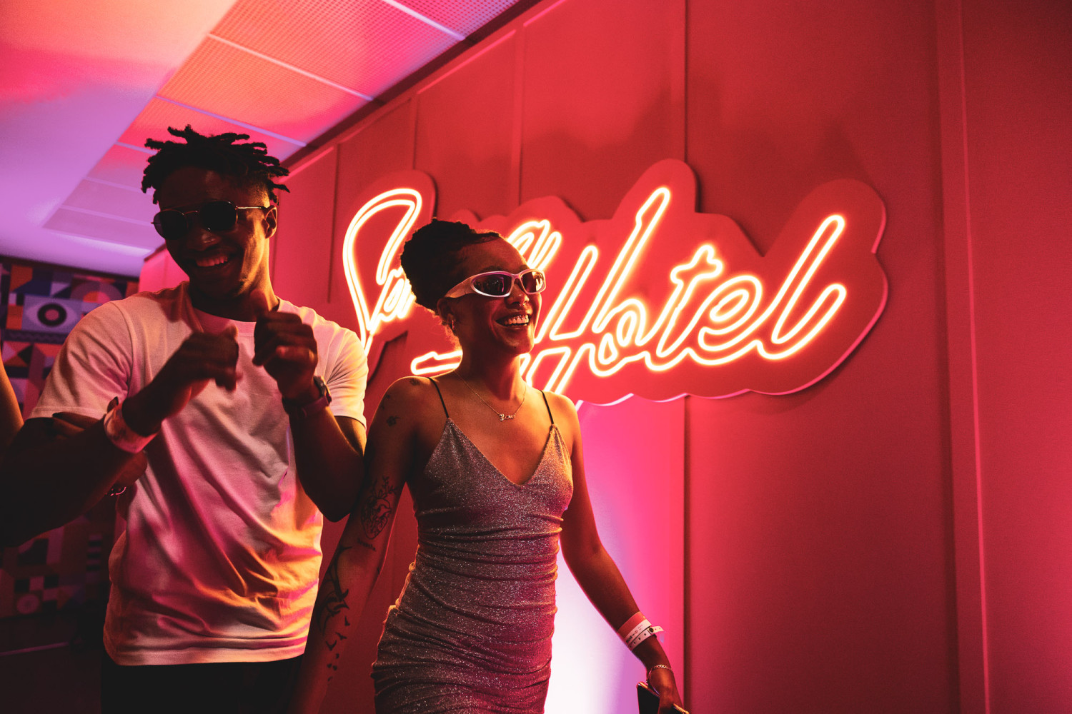 Couple enjoying night out at trendy hotel