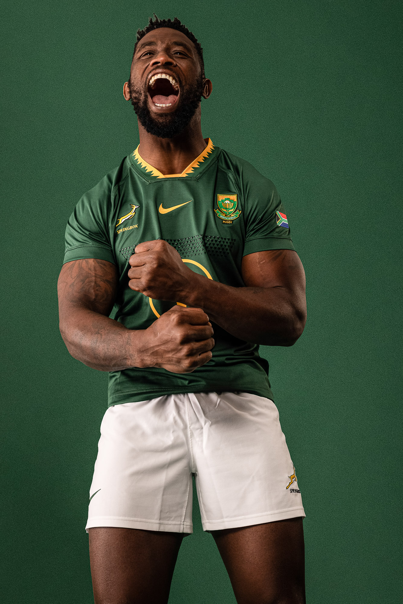Studio sports photography of rugby player Siya Kolisi in the official Nike Springbok jersey, for the South Africa rugby team.