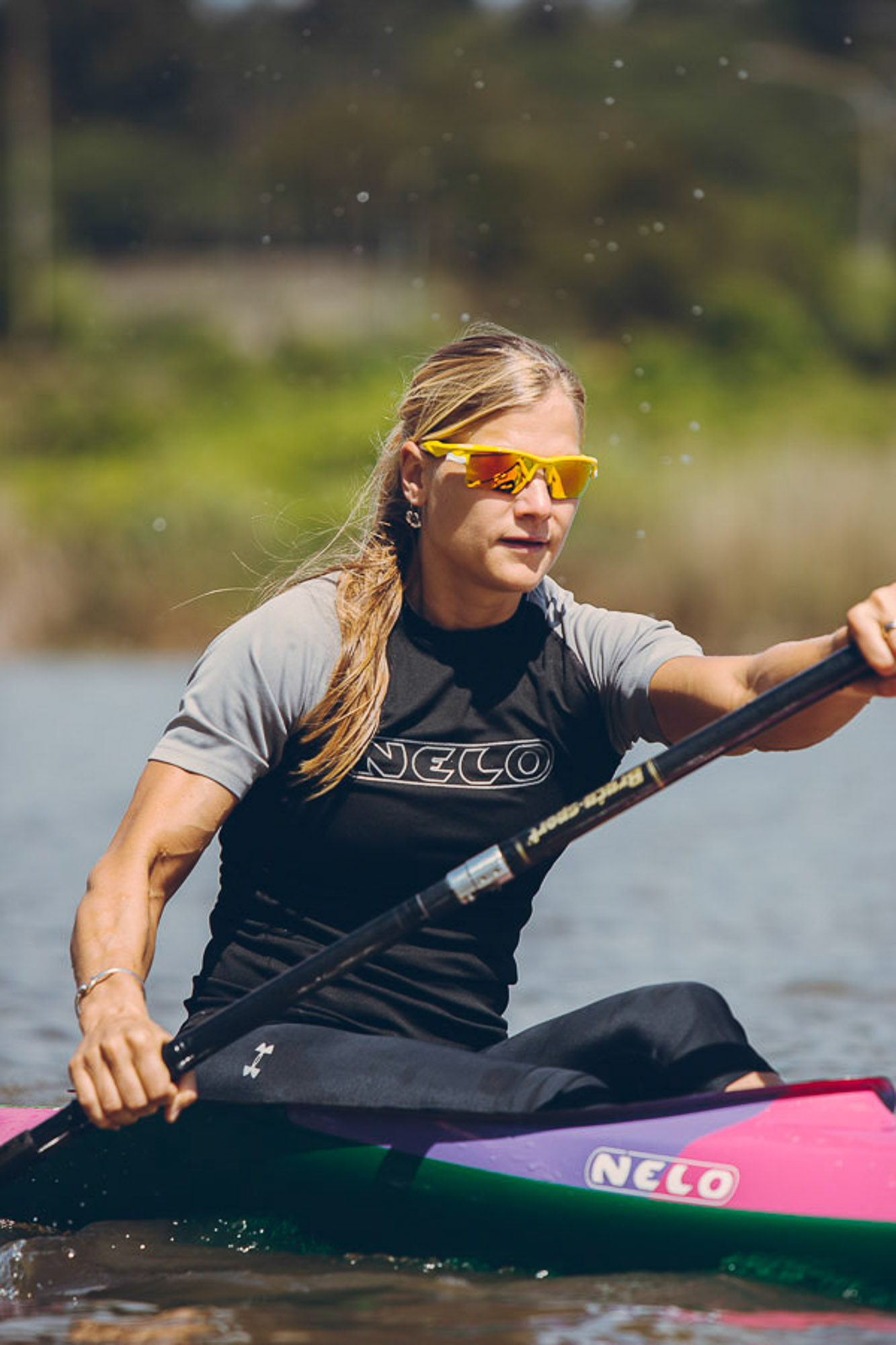 Kayaker Bridgitte Hartley in action on a sunny day by Cape Town photographer Casey Crafford